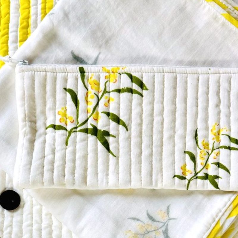 Lemon Foliage zip-top toiletry pouch with yellow flower prints